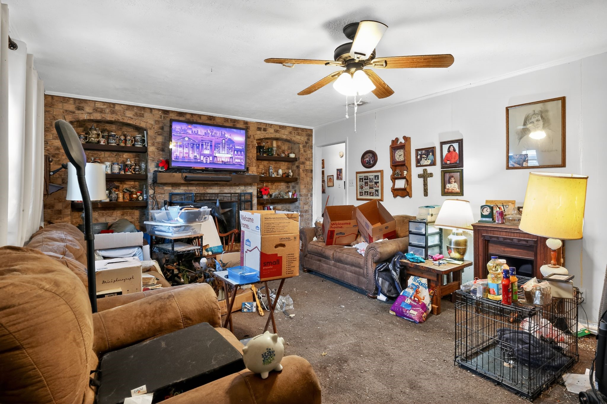 2319 Woodville Road Bryan, TX 77803 - Photo 3 of 15 a living room with furniture and a flat screen tv