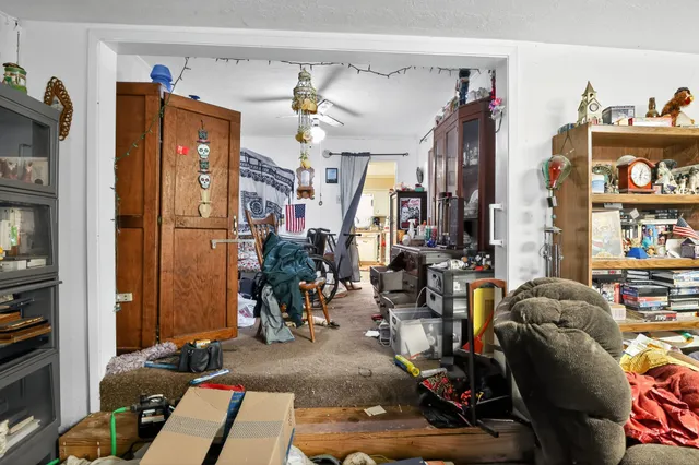 a view of a livingroom with furniture and toys