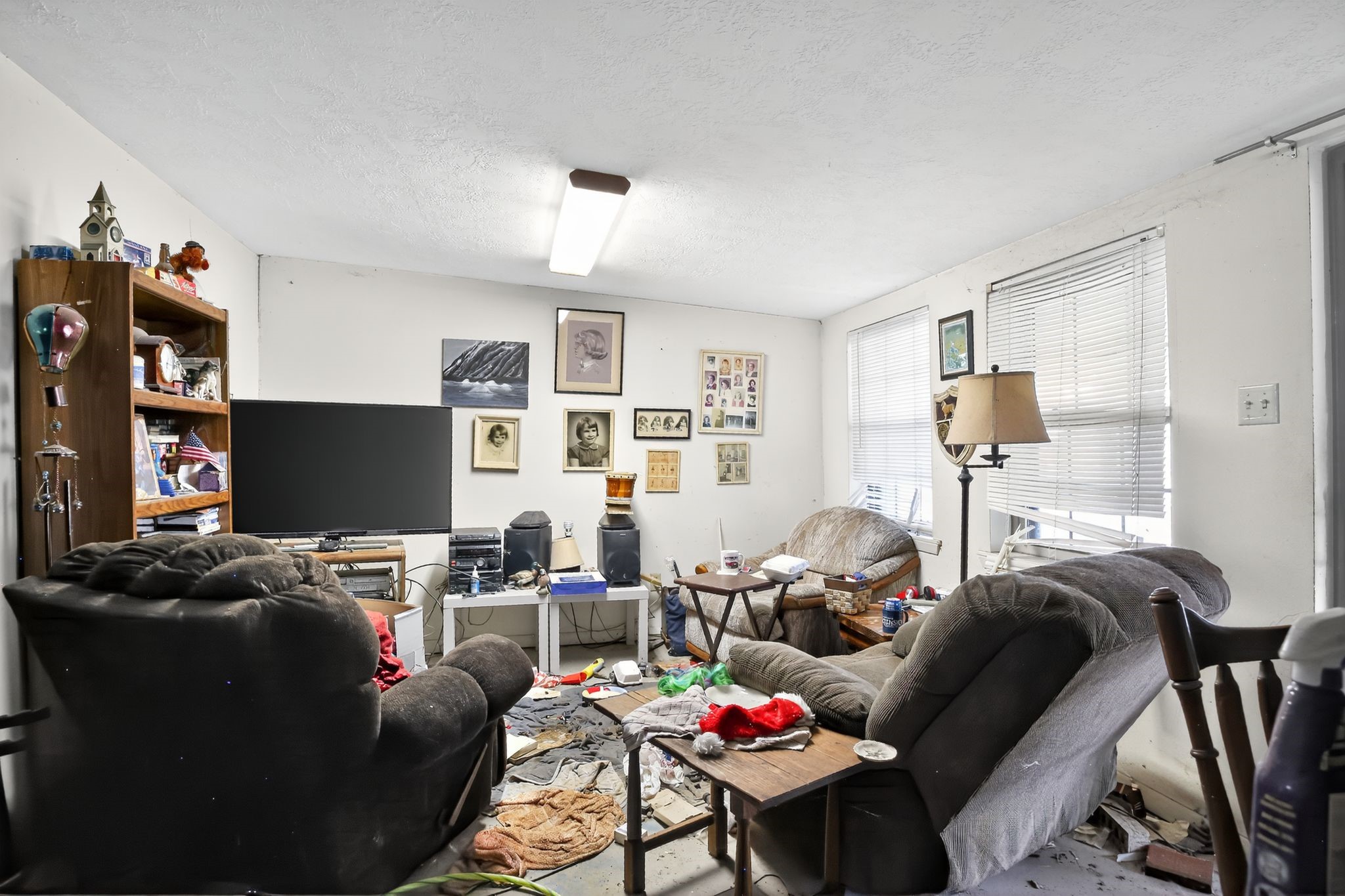 2319 Woodville Road Bryan, TX 77803 - Photo 9 of 15 a living room with furniture and a flat screen tv