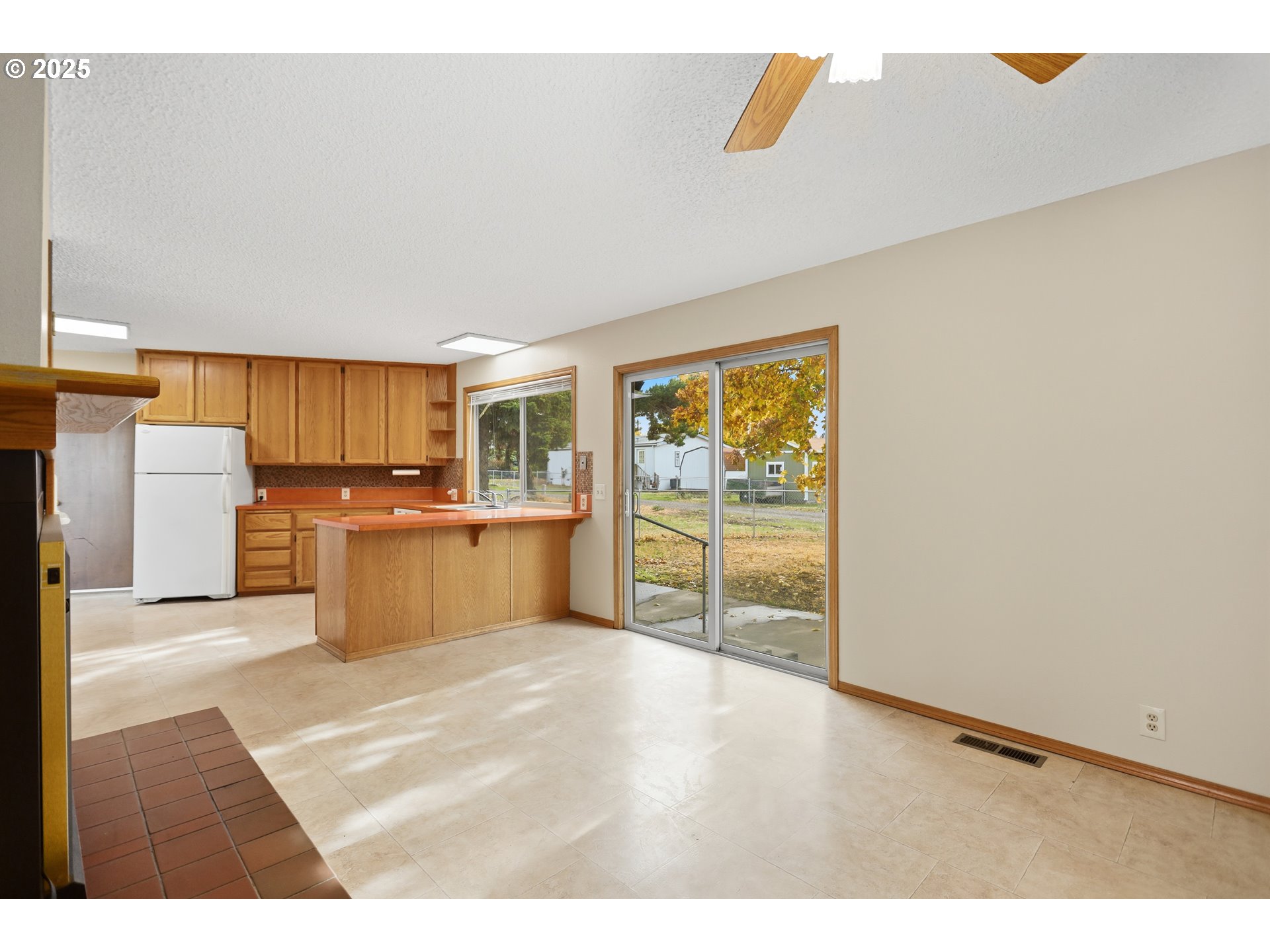512 6th Street Wasco, OR 97065 - Photo 11 of 45 a view of a kitchen with wooden cabinet