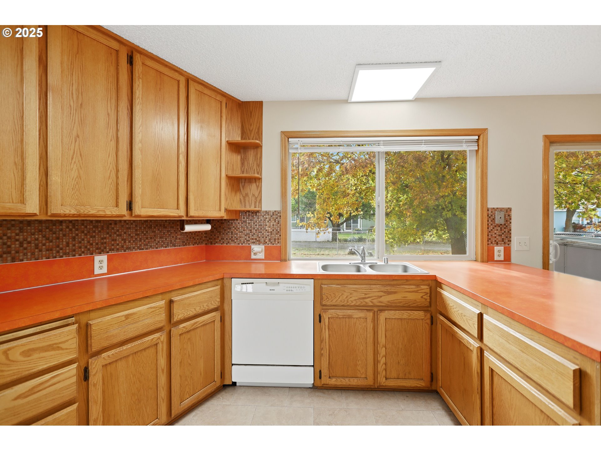 512 6th Street Wasco, OR 97065 - Photo 14 of 45 a kitchen with a sink stove and cabinets
