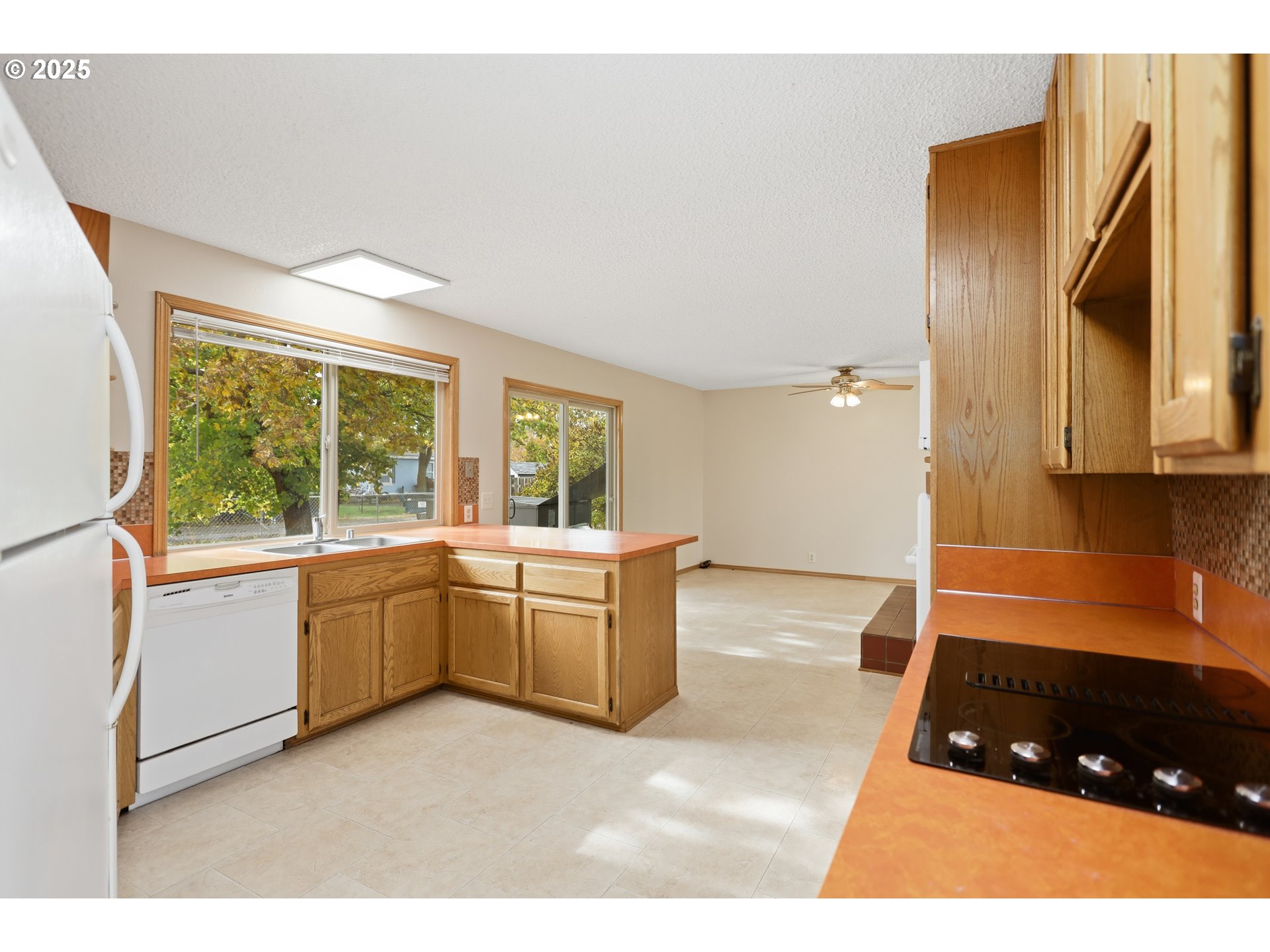 512 6th Street Wasco, OR 97065 - Photo 16 of 45 a kitchen with sink and cabinets