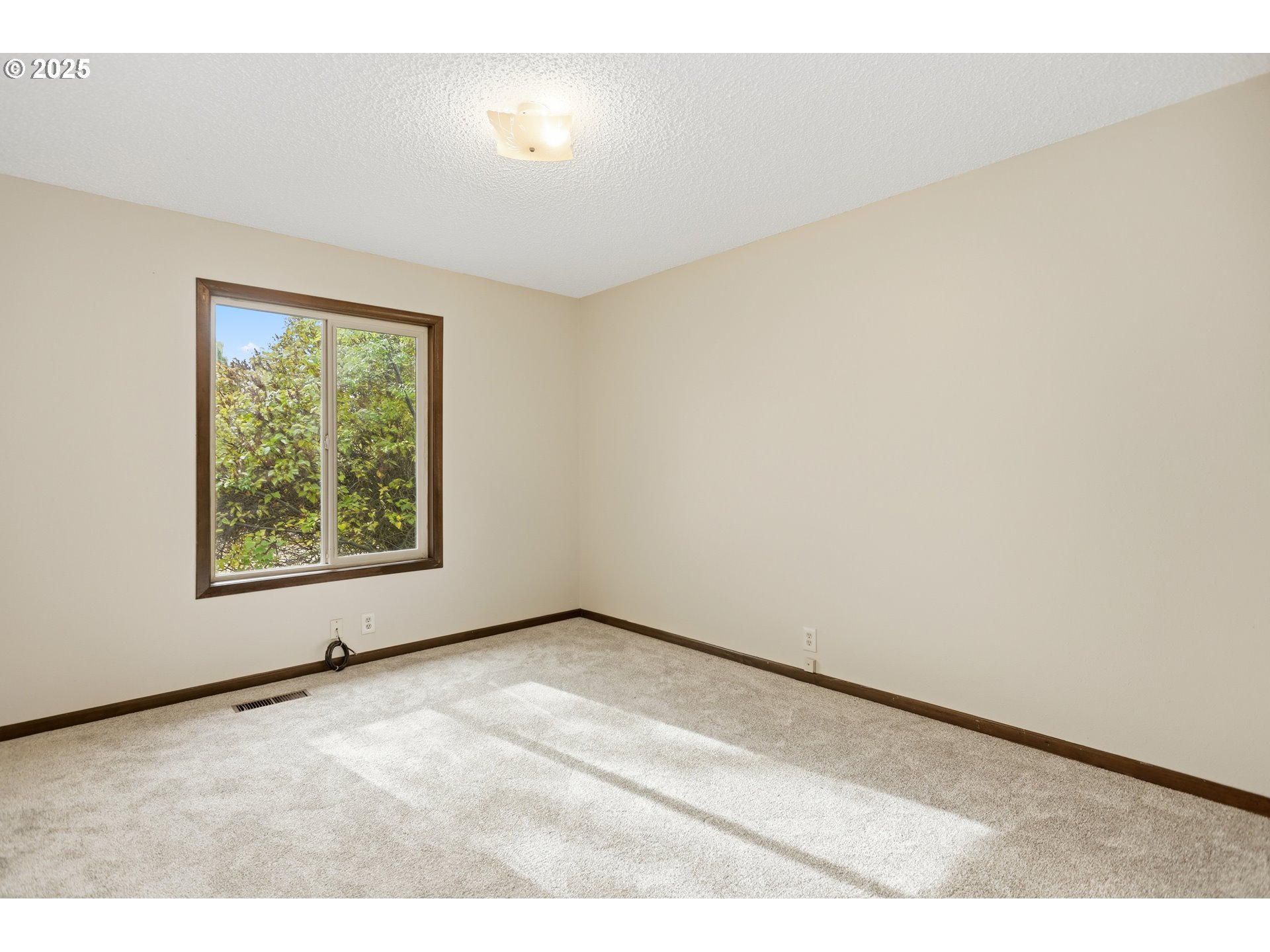 512 6th Street Wasco, OR 97065 - Photo 18 of 45 a view of an empty room with a window