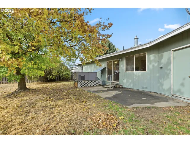 a house with trees in front of it