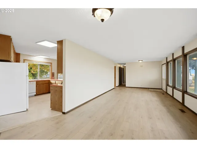 a view of a livingroom with wooden floor