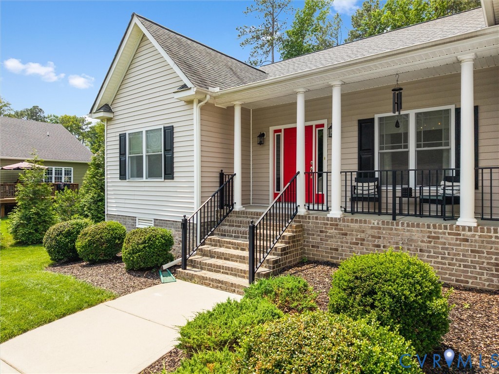 10824 Avening Road Chesterfield, VA 23832 - Photo 3 of 47 front view of a house with a yard