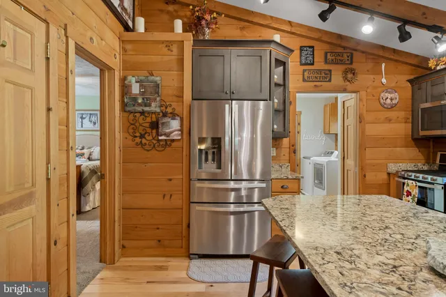 a room with furniture and a large window