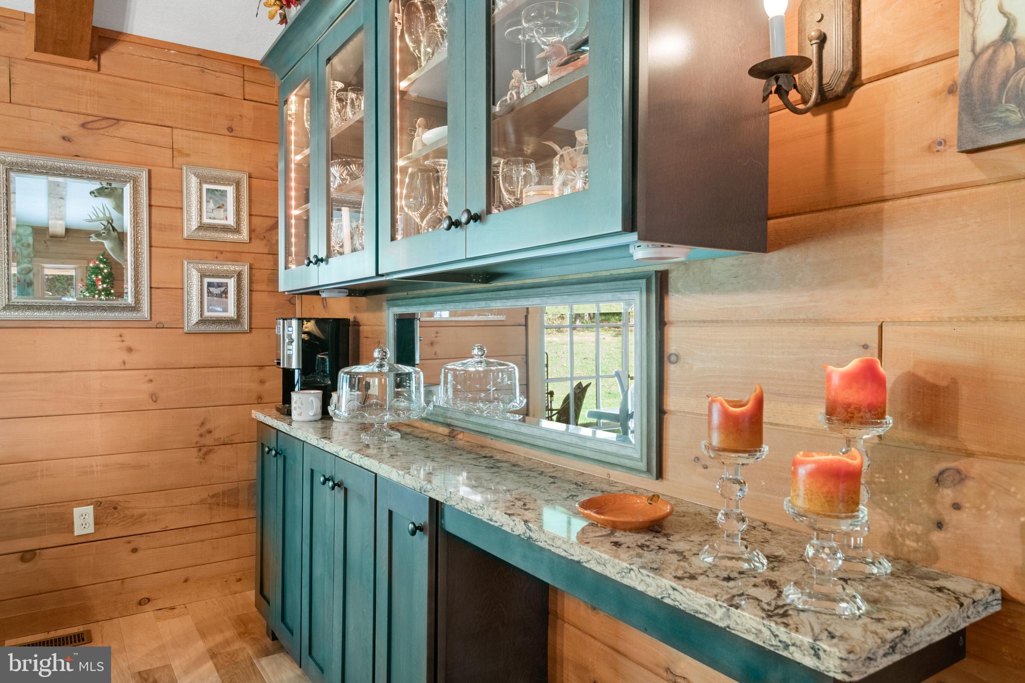 1967 Pinetown Road Wellsville, PA 17365 - Photo 19 of 58 a bathroom with a granite countertop sink and a window