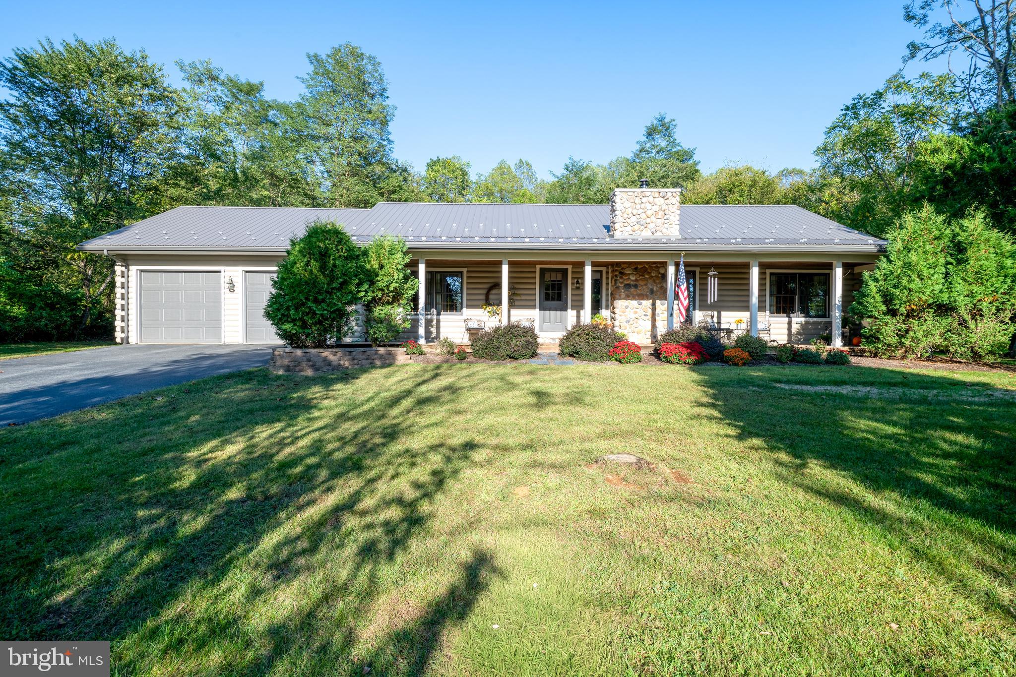 1967 Pinetown Road Wellsville, PA 17365 - Photo 3 of 58 a front view of house with yard and green space