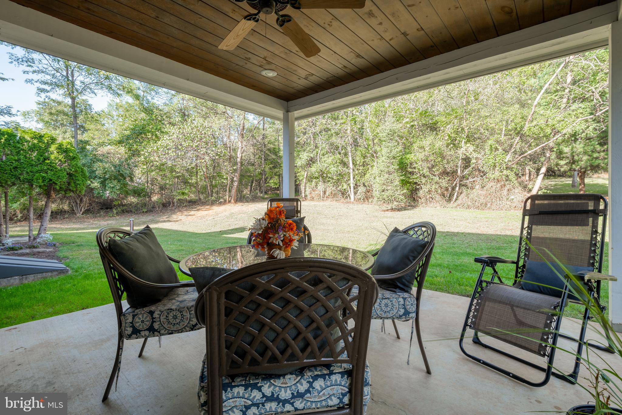 1967 Pinetown Road Wellsville, PA 17365 - Photo 32 of 58 a view of a porch with furniture and a yard
