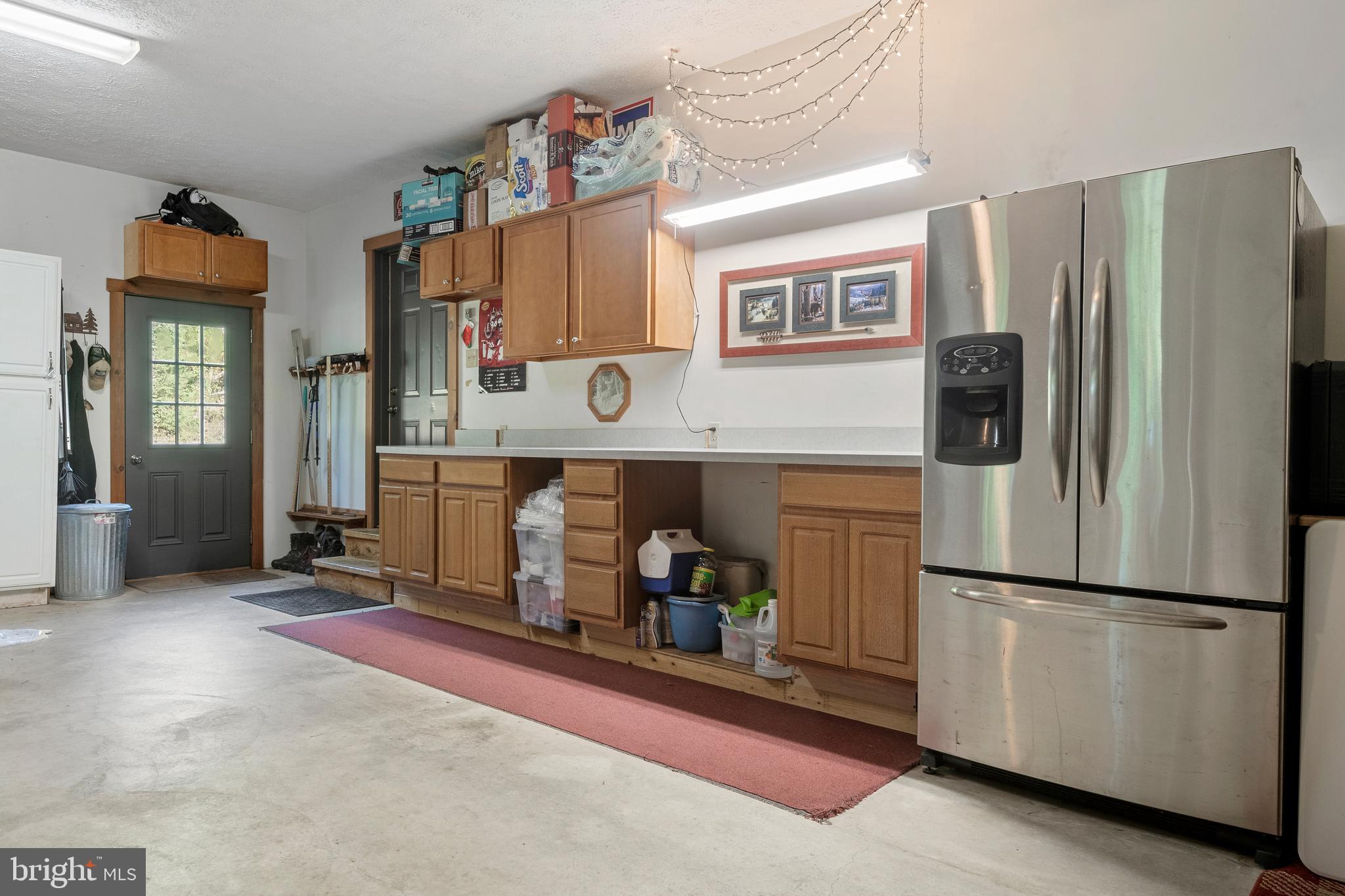 1967 Pinetown Road Wellsville, PA 17365 - Photo 34 of 58 a kitchen with stainless steel appliances granite countertop a refrigerator and a sink