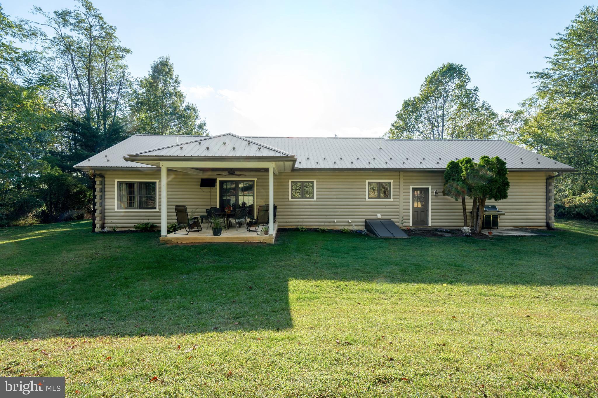 1967 Pinetown Road Wellsville, PA 17365 - Photo 35 of 58 a front view of a house with a garden