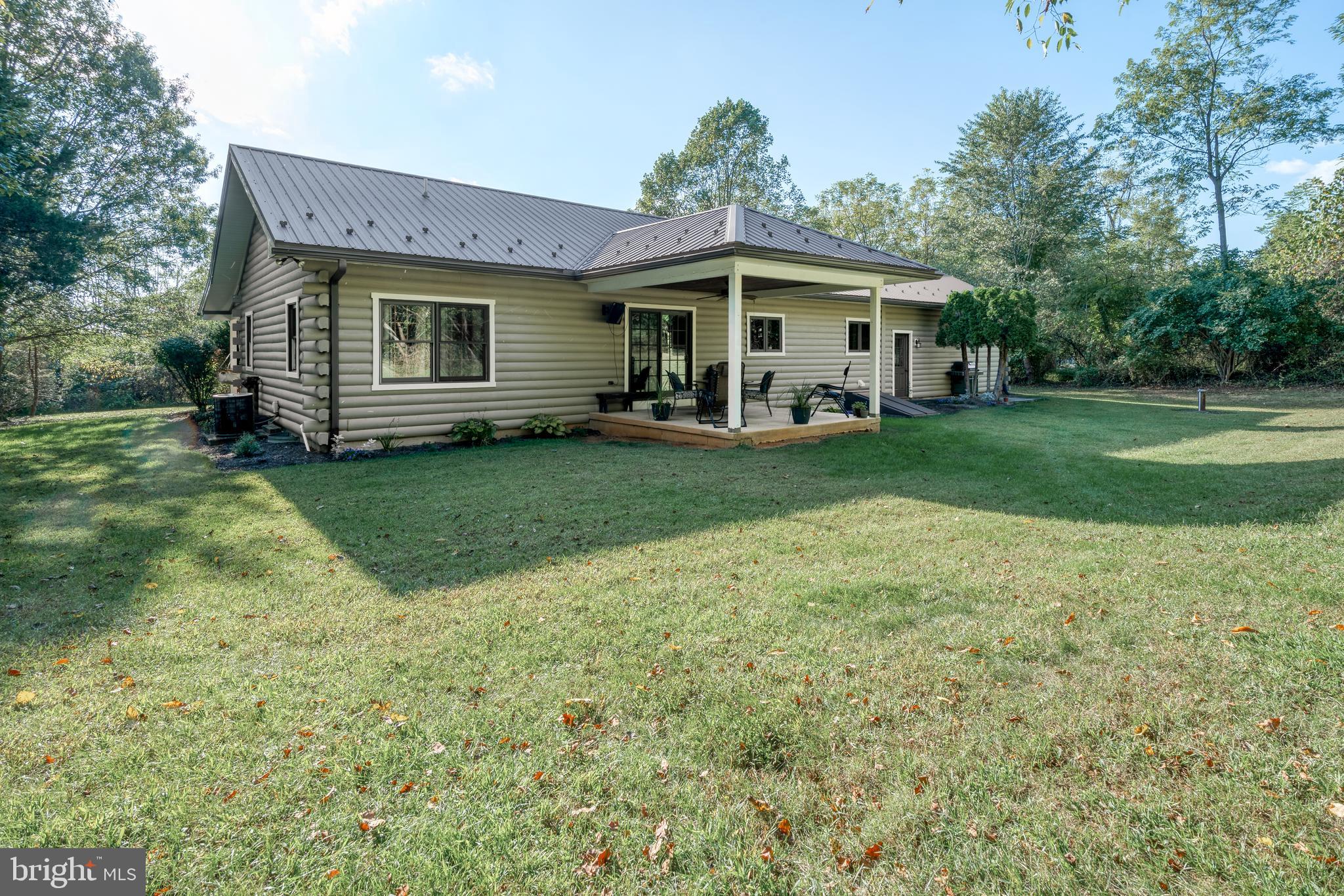 1967 Pinetown Road Wellsville, PA 17365 - Photo 36 of 58 a front view of a house with a garden