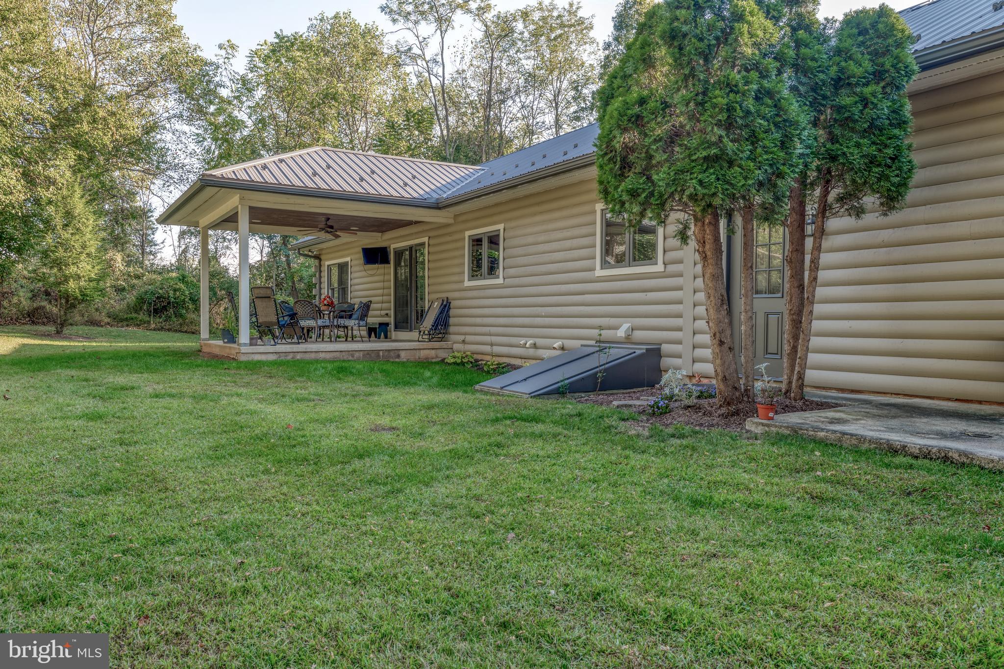 1967 Pinetown Road Wellsville, PA 17365 - Photo 37 of 58 a view of a house with a yard and sitting area