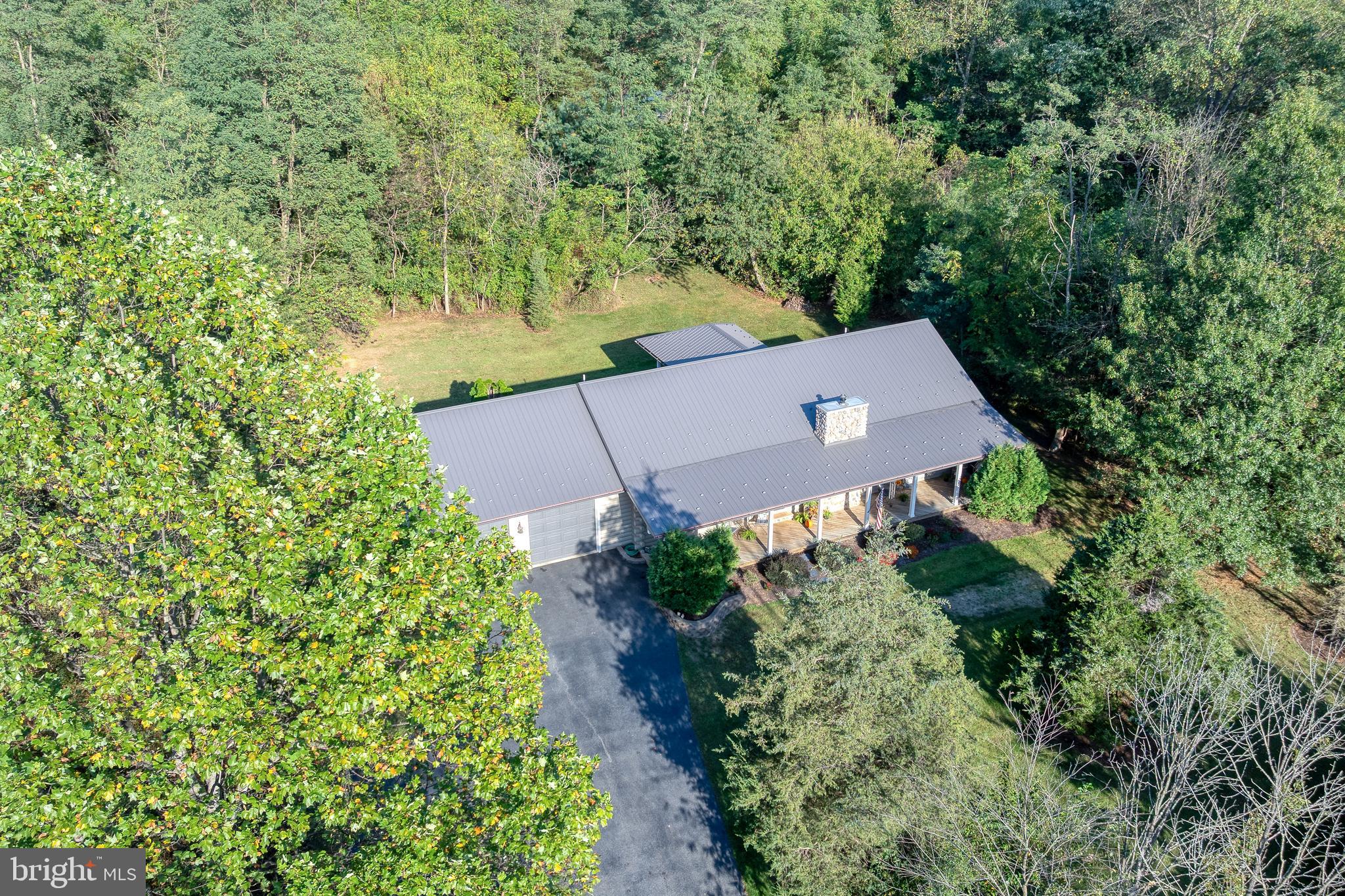 1967 Pinetown Road Wellsville, PA 17365 - Photo 50 of 58 an aerial view of a house with a yard and garden