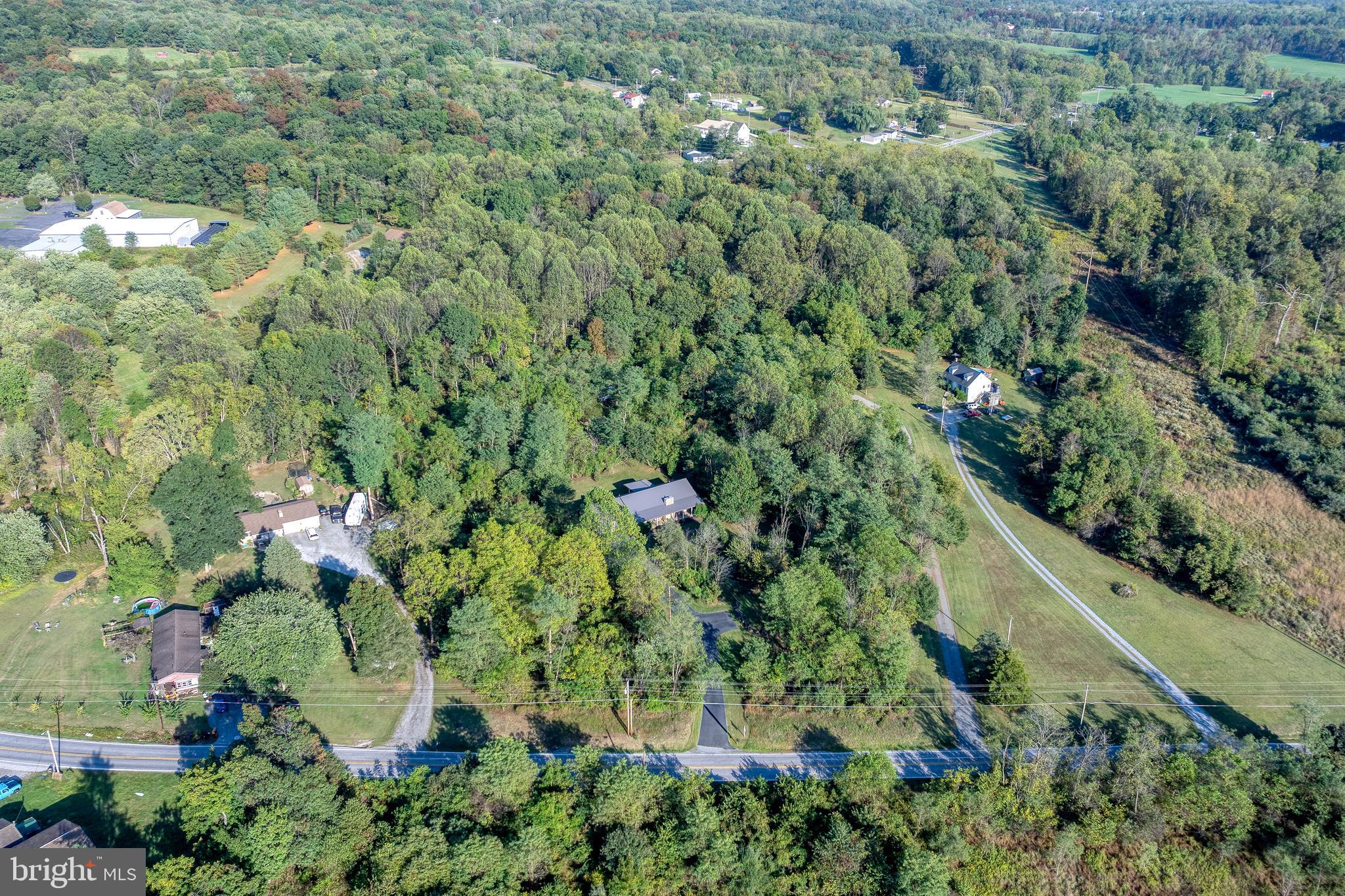 1967 Pinetown Road Wellsville, PA 17365 - Photo 56 of 58 an aerial view of residential house with outdoor space and trees all around