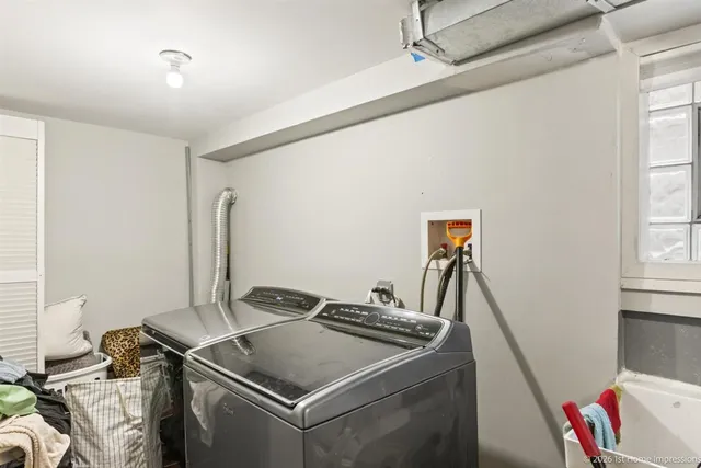 a utility room with dryer and washer