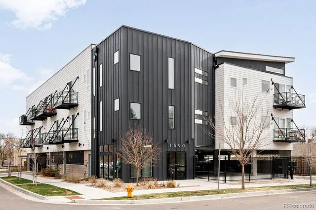 a front view of a building with a street