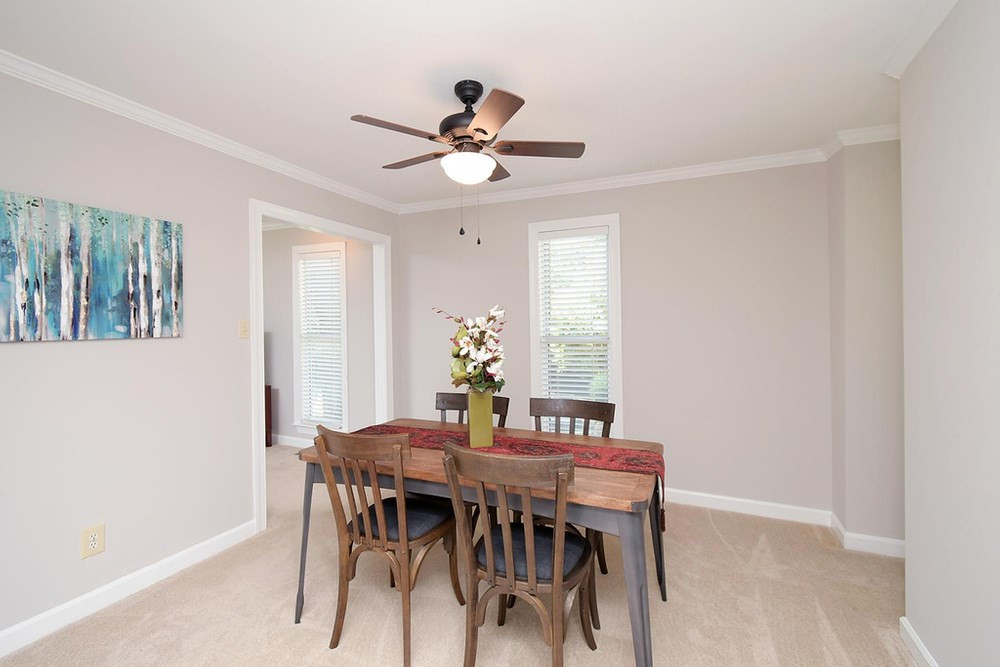 5903 Sentinel Drive Raleigh, NC 27609 - Photo 10 of 26 Separate Dining Room with ceiling fan and crown molding. Dining Room