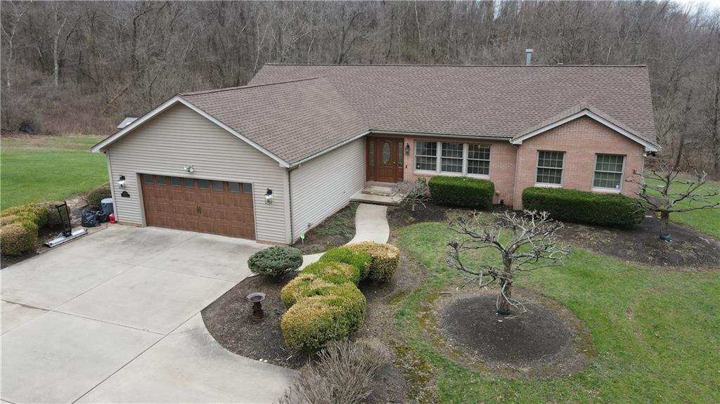 a house view with a backyard space