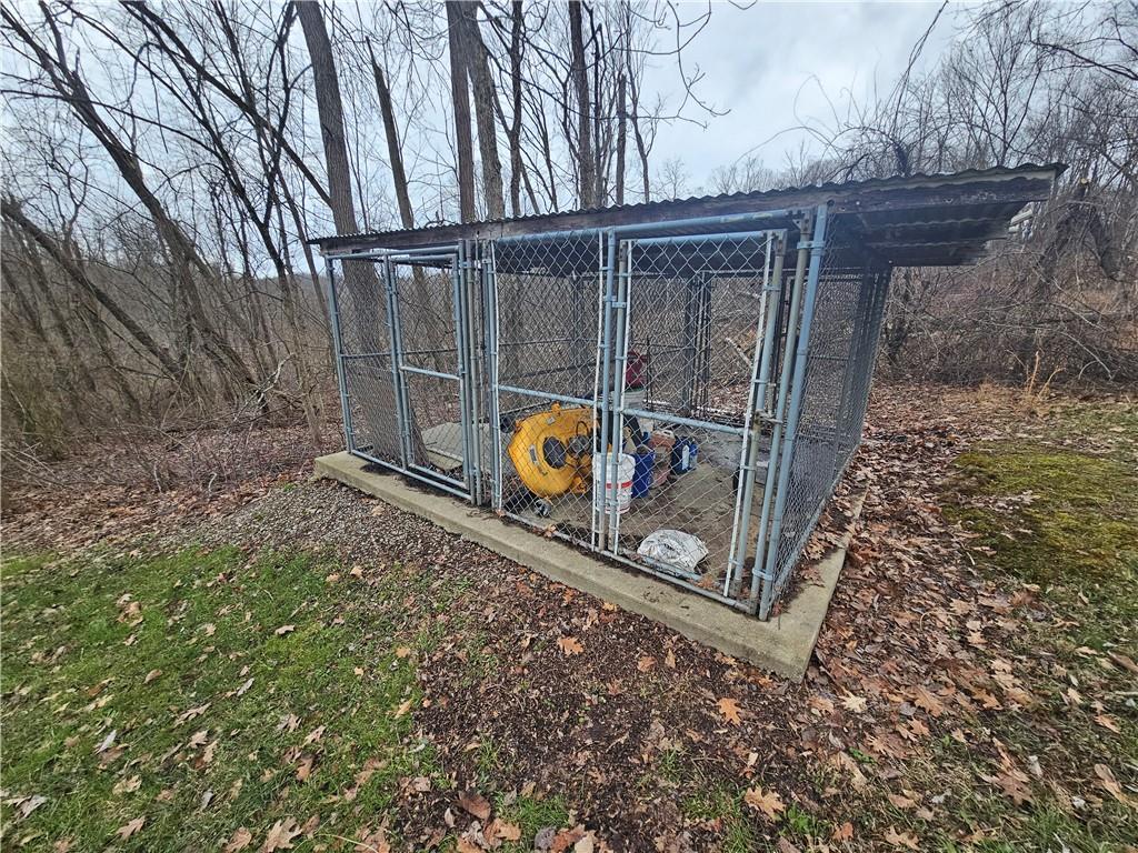 225 Profio Road McDonald, PA 15057 - Photo 17 of 49 a backyard of a house with barbeque oven