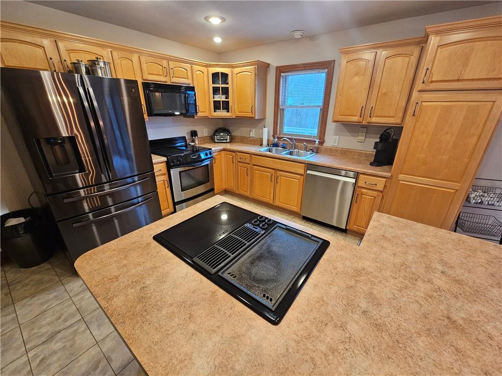 225 Profio Road McDonald, PA 15057 - Photo 19 of 49 a kitchen with stainless steel appliances a refrigerator stove and sink