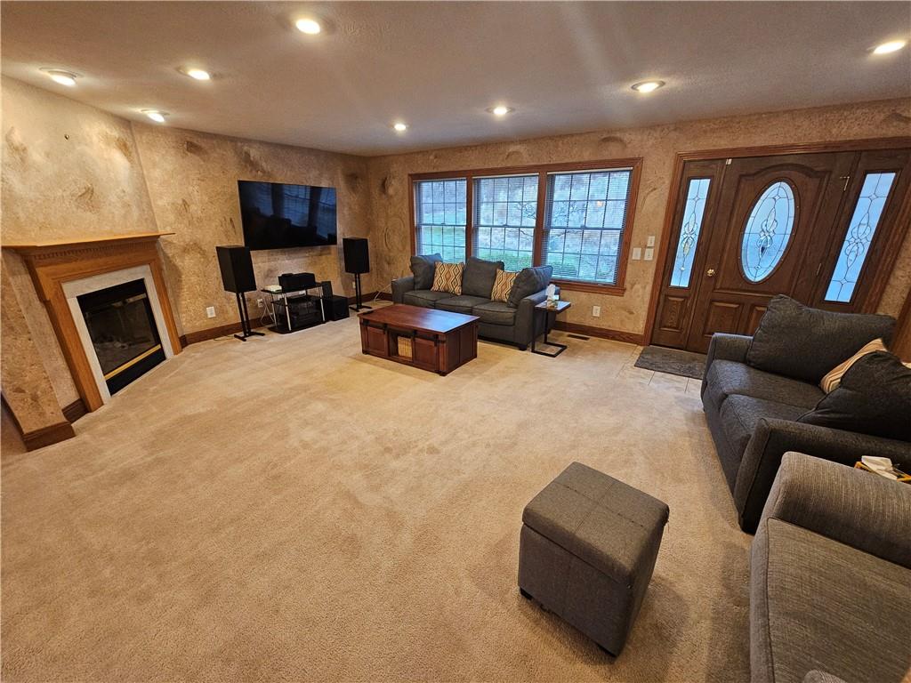 225 Profio Road McDonald, PA 15057 - Photo 22 of 49 a living room with furniture flat screen tv and a fireplace