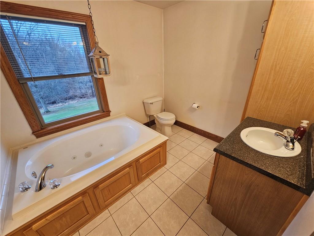 225 Profio Road McDonald, PA 15057 - Photo 24 of 49 a bathroom with a sink and a mirror