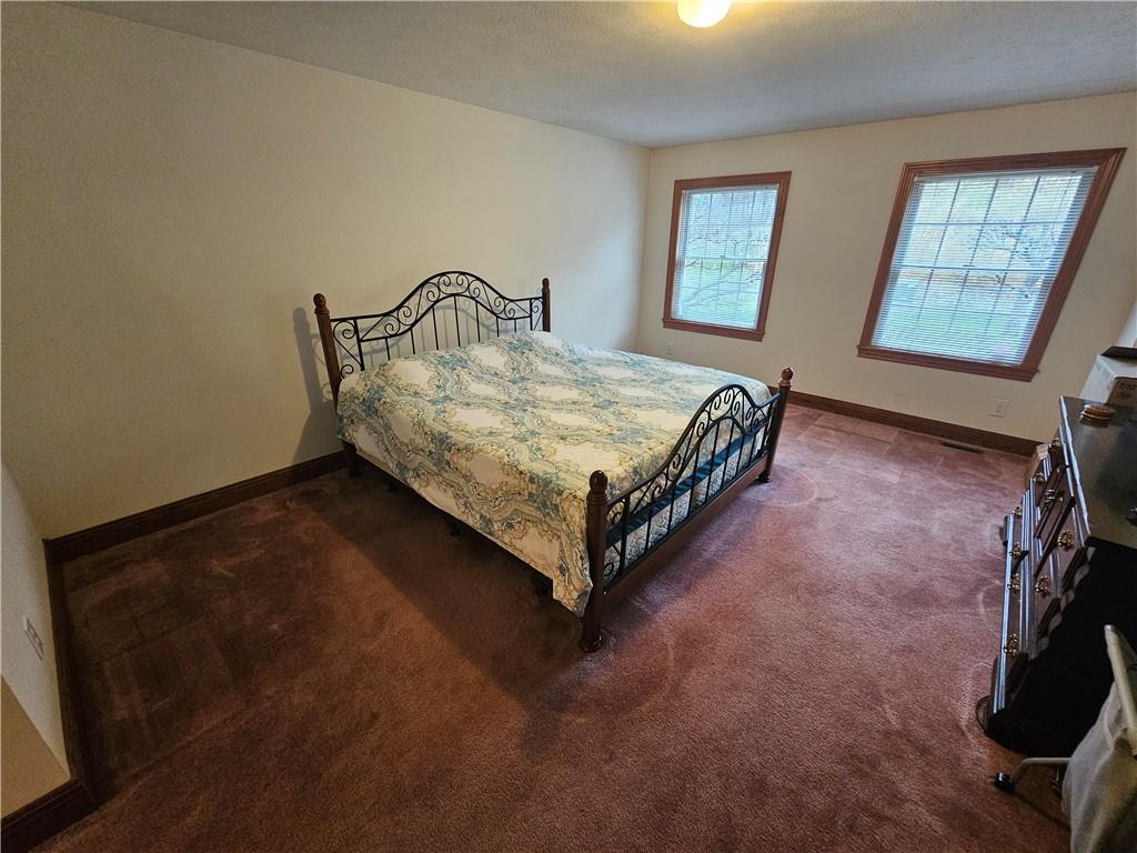 225 Profio Road McDonald, PA 15057 - Photo 25 of 49 a bedroom with a bed and window