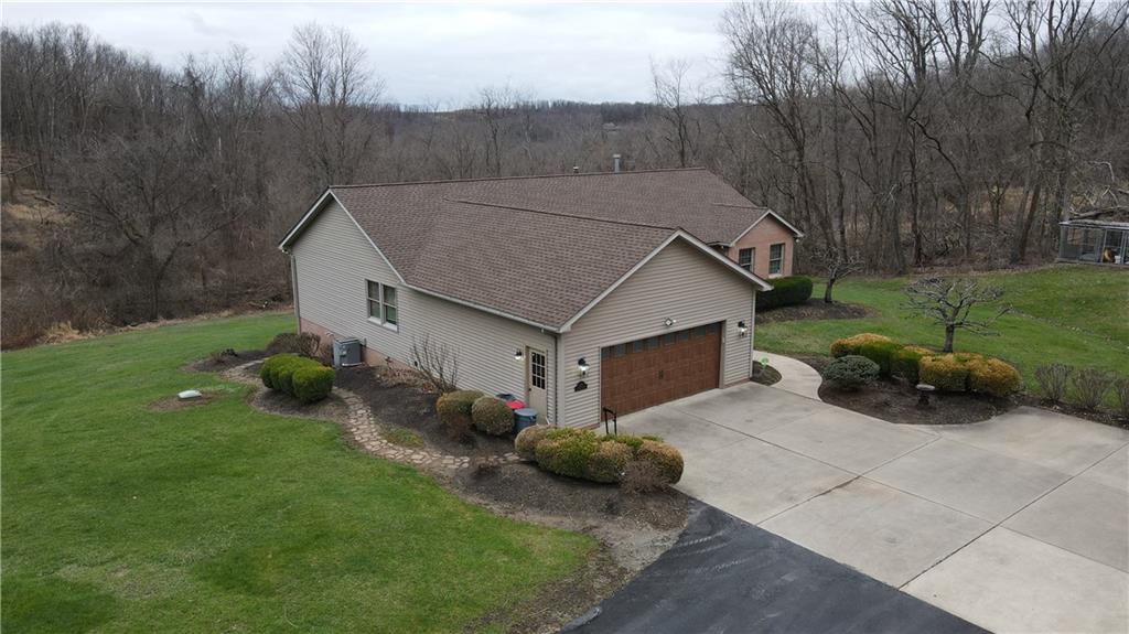 225 Profio Road McDonald, PA 15057 - Photo 3 of 49 a view of a house with backyard and garden