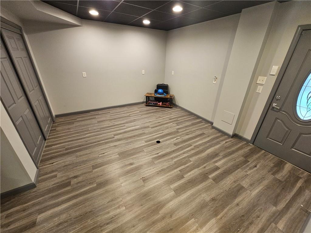 225 Profio Road McDonald, PA 15057 - Photo 38 of 49 a room with wooden floor and furniture