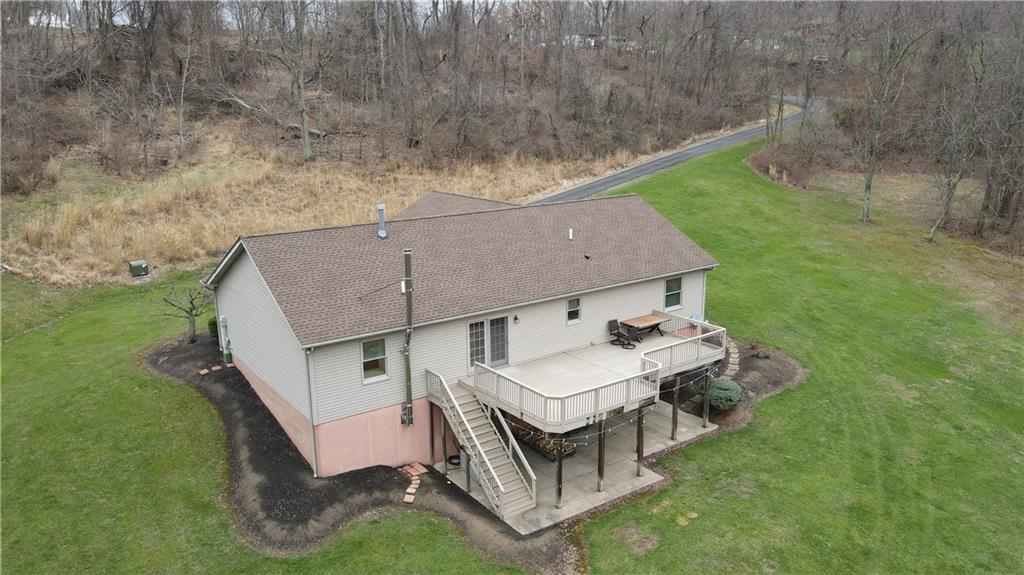225 Profio Road McDonald, PA 15057 - Photo 6 of 49 an aerial view of a house with porch yard basket ball court and trampoline