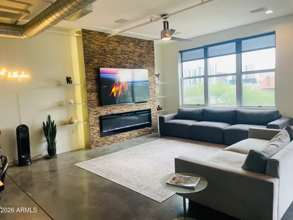 a view of a brick building with many windows