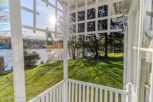 a view of a balcony with an outdoor space