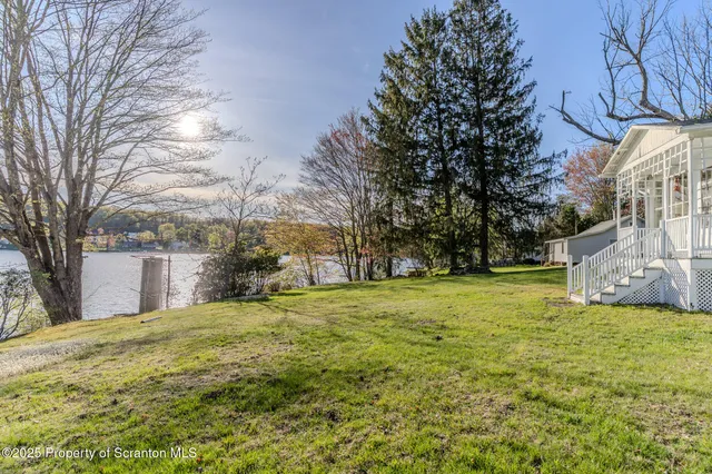a view of a yard with an outdoor space
