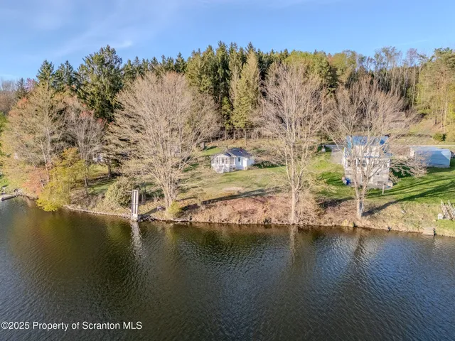 a view of ocean with mountain