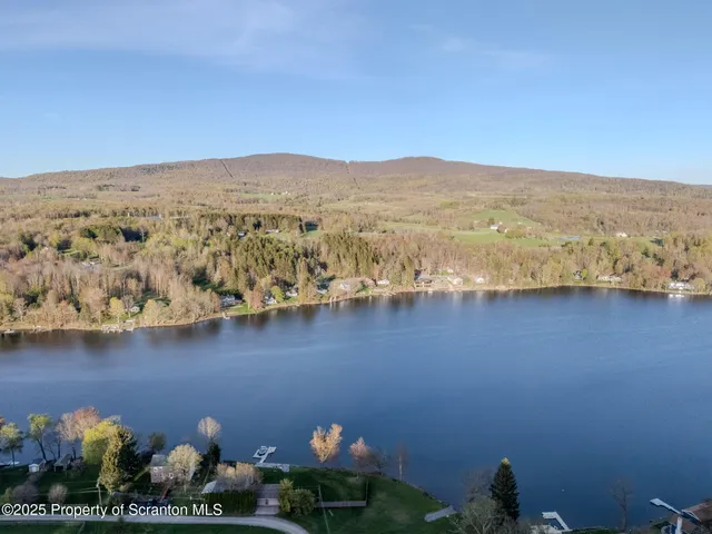 a picture of a bench in front of a window