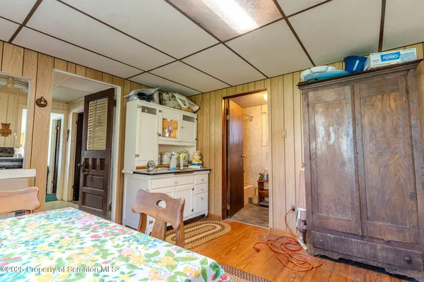 a bed room with a bed and a table