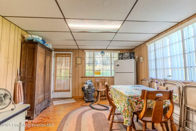 a bathroom with a sink a toilet and shower curtain