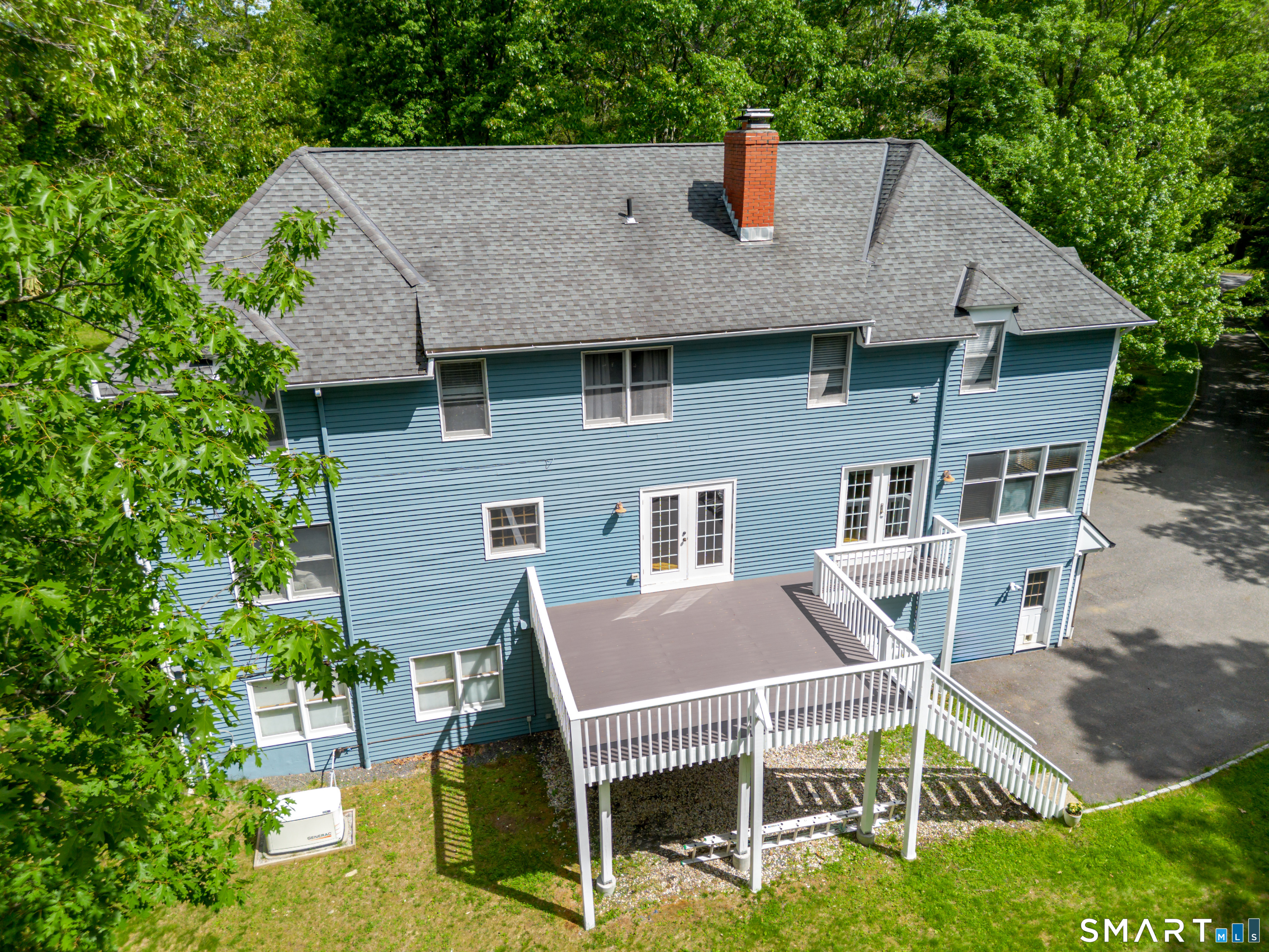 3 Partridge Trail Sherman, CT 06784 - Photo 7 of 37 a aerial view of a house with a yard patio and slide