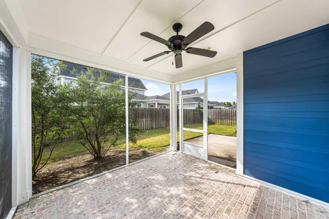 a view of a livingroom with a ceiling fan