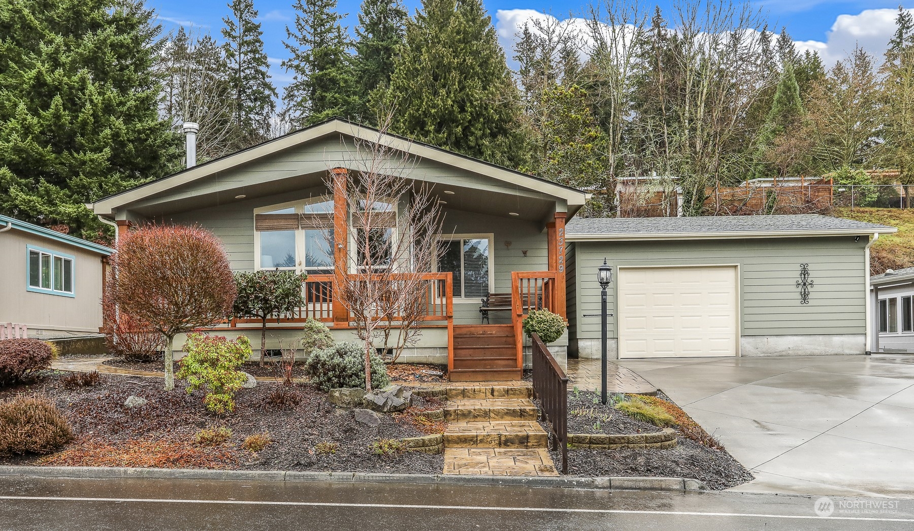 23729 7th Place West Bothell, WA 98021 - Photo 1 of 40 a front view of a house with garden