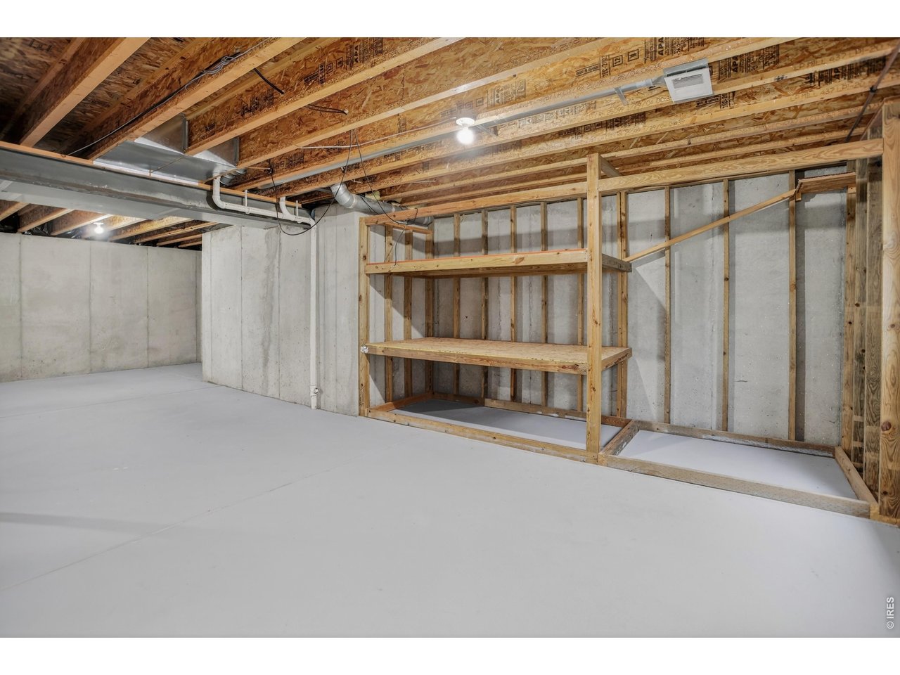3000 Swan Point Court Evans, CO 80620 - Photo 29 of 38 Unfinished Basement with Built-Ins for Storage