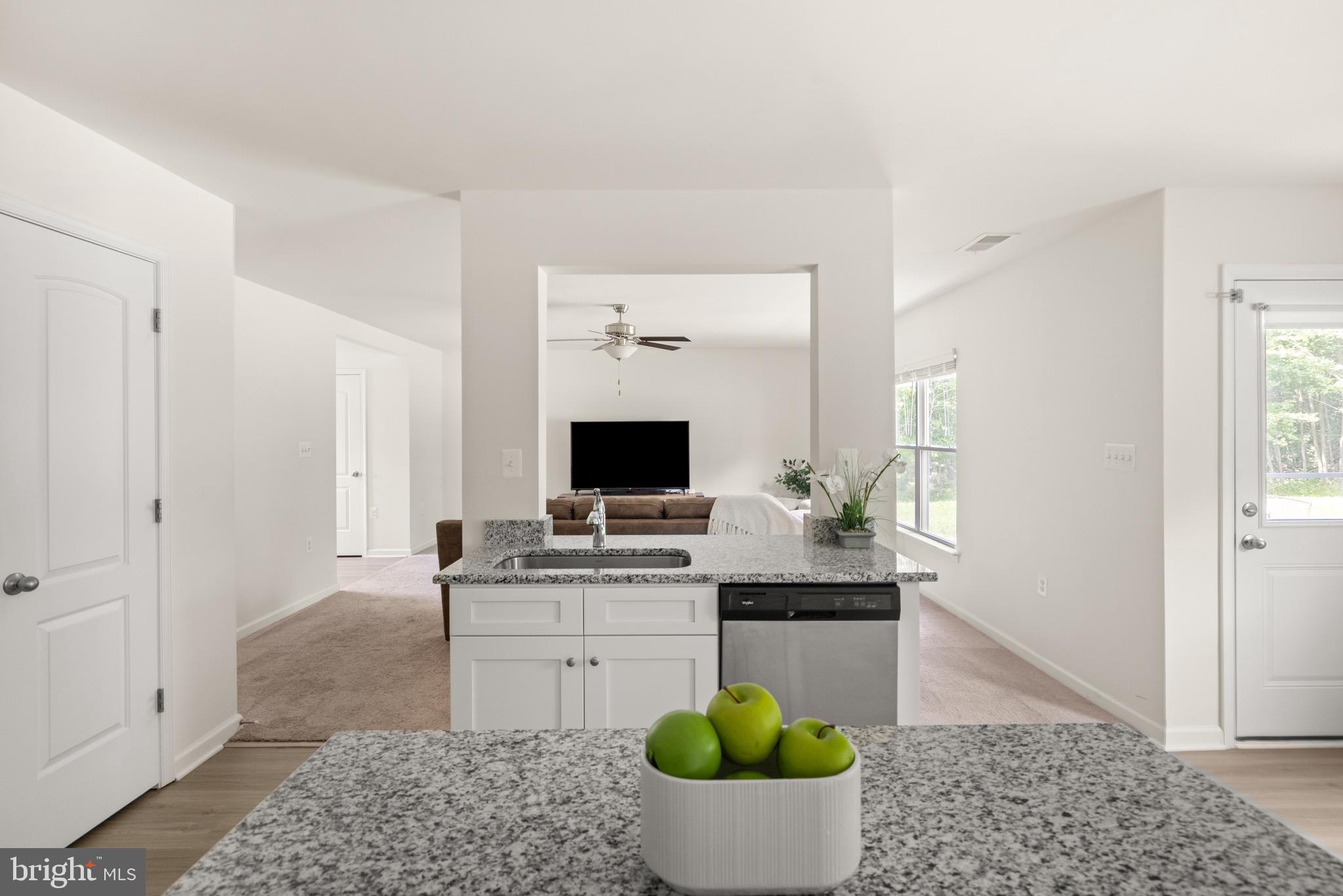 259 Headwaters Drive Falling Waters, WV 25419 - Photo 11 of 34 a room with a couch and a view of bathroom