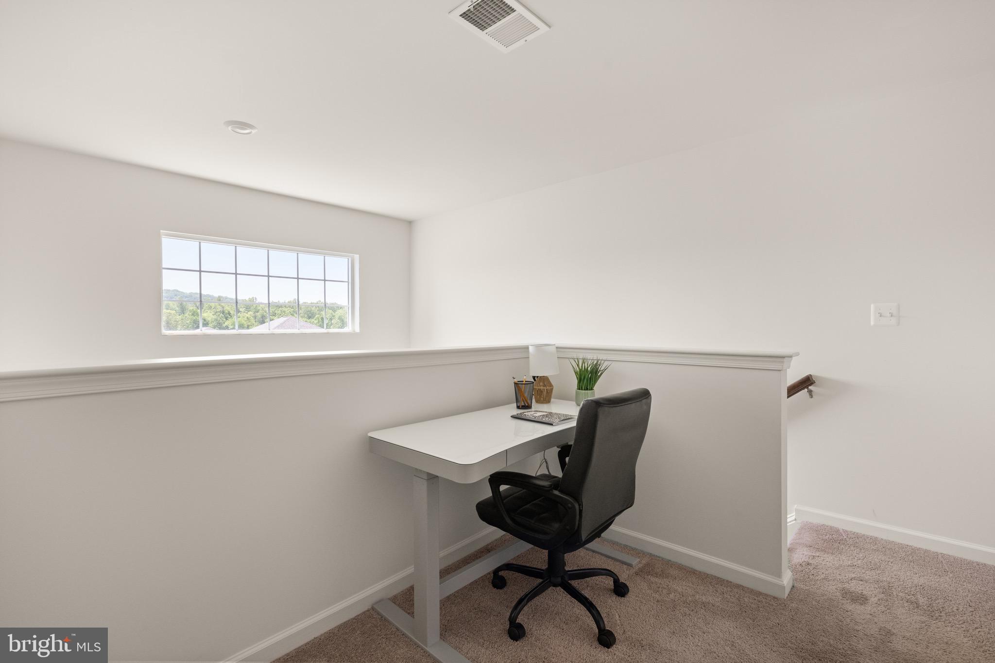 259 Headwaters Drive Falling Waters, WV 25419 - Photo 14 of 34 a workspace with furniture and a window