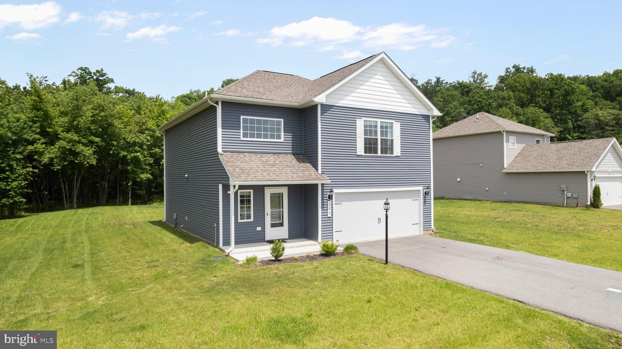 259 Headwaters Drive Falling Waters, WV 25419 - Photo 27 of 34 a view of a house with a yard and fence