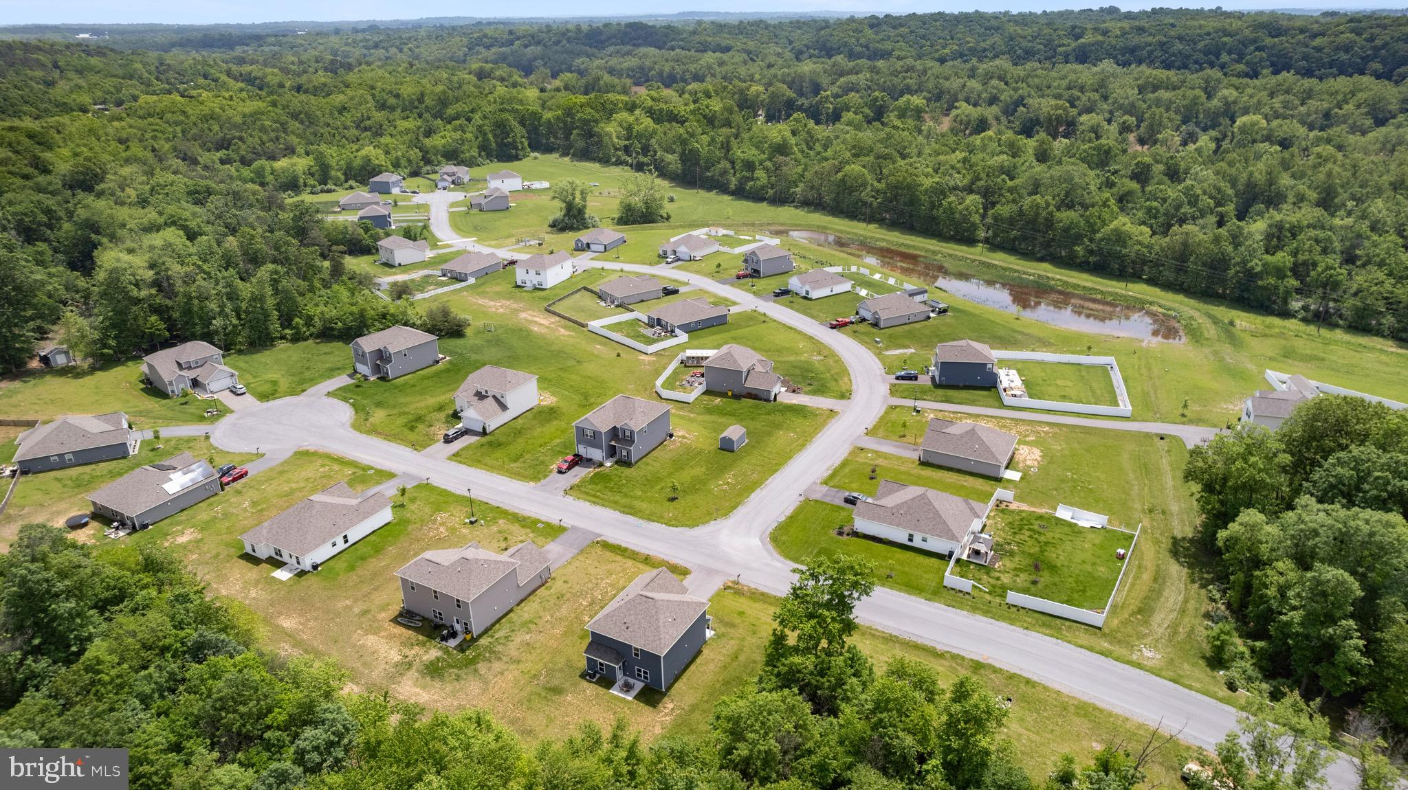 259 Headwaters Drive Falling Waters, WV 25419 - Photo 31 of 34 an aerial view of a house with a garden