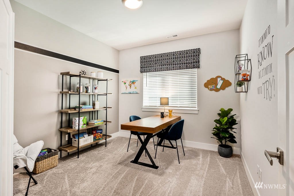 609 215th Street Southeast, Unit RM23 Bothell, WA 98021 - Photo 11 of 23 a room with furniture and book shelf