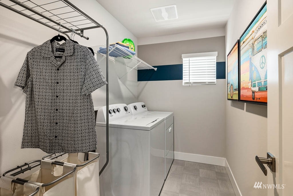 609 215th Street Southeast, Unit RM23 Bothell, WA 98021 - Photo 22 of 23 a bathroom with a sink and mirror