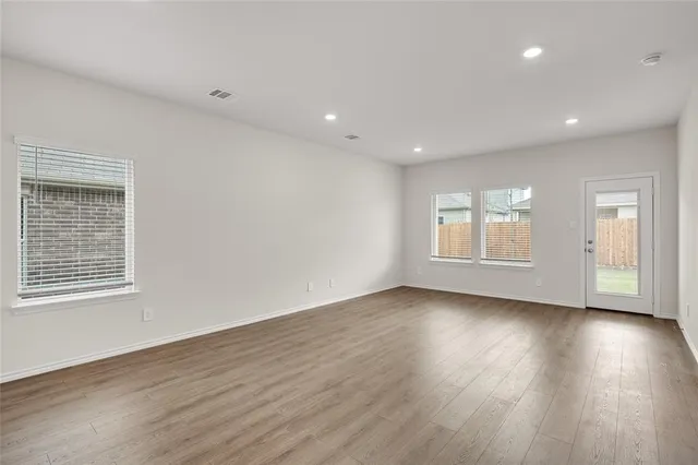 a view of kitchen with wooden floor